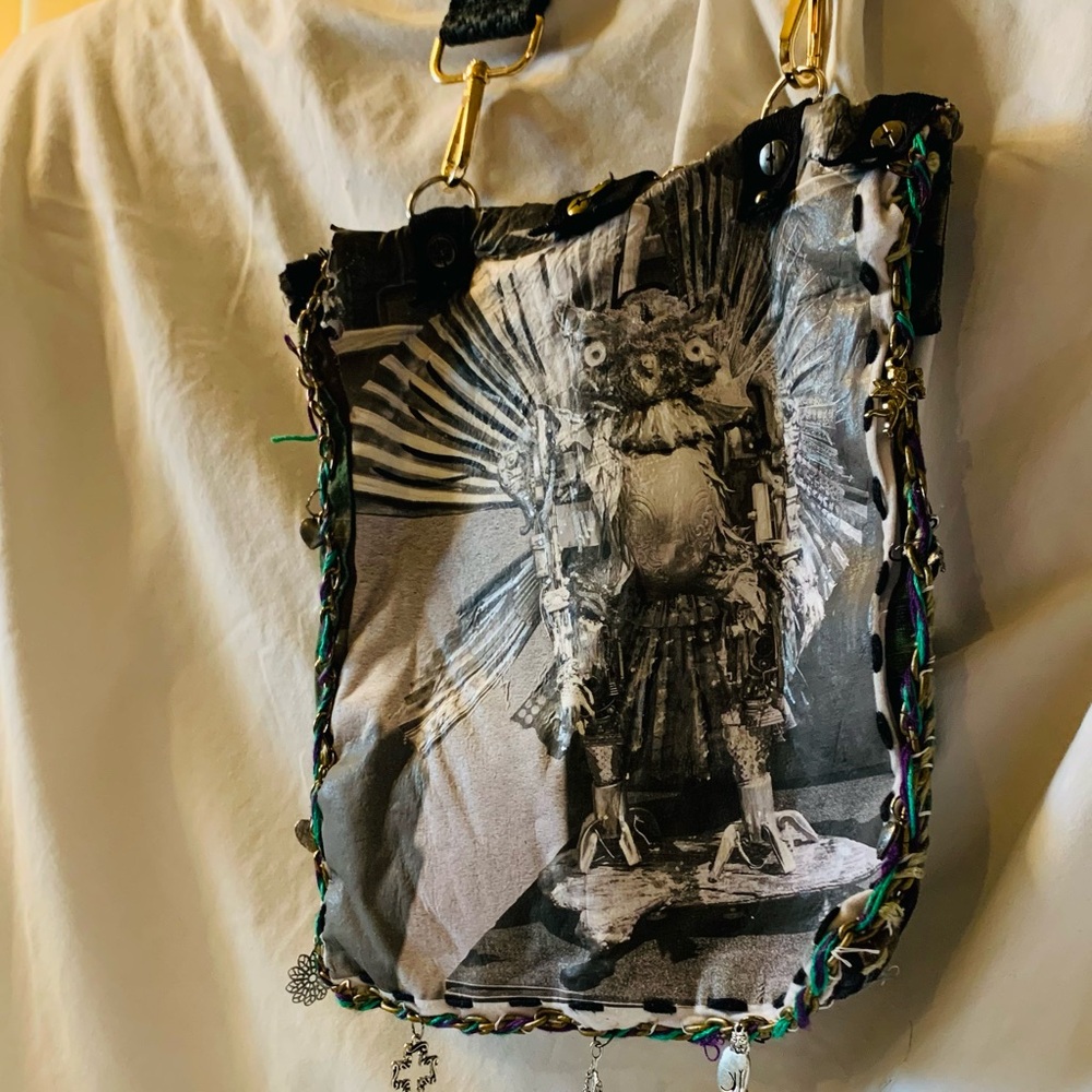 Camouflage Crossbody Bag with Gold Accents and Image of JK Punkmetal Sculpture. - Picture 5 of 7